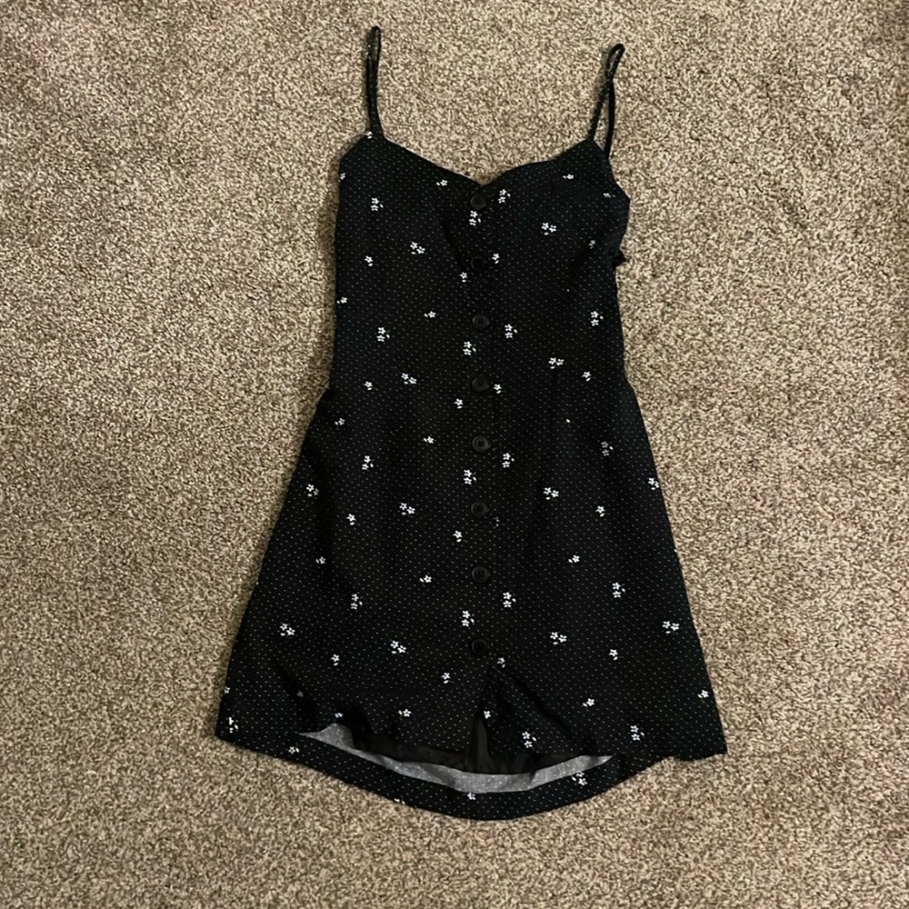 Black floral sundress. Button up front, tie back. Size Medium.